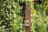 Garden decoration - fence post with tea light