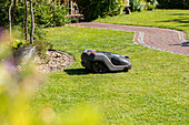 Lawn mowing robot