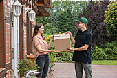 Delivery service - supplier hands over parcel