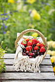 Basket with strawberries and cherries