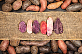 different types of potatoes cut into slices