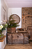 Rustic decoration with fir tree on wooden chest