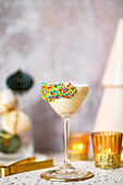Christmas biscuit martini with sugar sprinkles