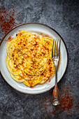 Yellow beetroot carpaccio with honey, walnuts and chilli