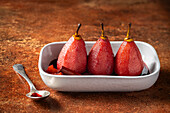 Pears in red wine with cinnamon