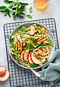 Rice salad with chicken, avocado and fried halloumi