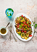 Grilled aubergine and tomato salad