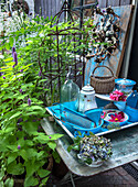 Blue vintage decoration on a table in the garden