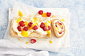 Brown sugar meringue roll with lemon curd and raspberries