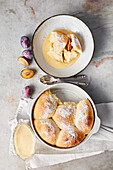 Dumplings with plum filling and orange and vanilla sauce (vegan)