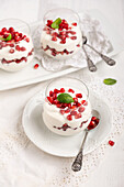 Vegan quark cream pomegranate dessert in a jar