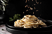 Pasta with cream and black truffle