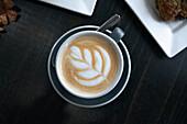 Cappuccino with milk foam pattern