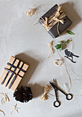 Natural-look gift packaging with jute ribbon and black accents