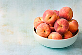 Peaches in a bowl