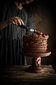 Layered chocolate cake with chocolate frosting