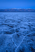 Salt formations at Badwater Basin during the blue hour in Death Valley National Park, California.