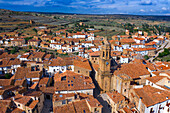 Aerial view of Bell tower of the Church of the Purification and Nublos Tower, La Iglesuela del Cid, Teruel, Aragon, Spain