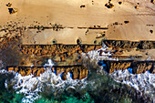 Aerial view of piscinas naturales de Bolonia natural pools, Bolonia, Costa de la Luz, Cadiz Province, Andalusia, southern Spain. Bolonia beach. Playa de Bolonia.