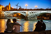 Isabel II bridge or Triana bridge. Guadalquivir river. Seville, Andalusia, Spain.