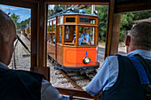 Driver of the vintage tram at the Soller village. The tram operates a 5kms service from the railway station in the Soller village to the Puerto de Soller, Soller Majorca, Balearic Islands, Spain, Mediterranean, Europe.