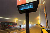 Foggy winter cityscape as temperatures go down in Zaragoza, Spain