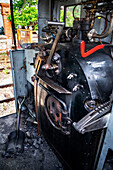 Coal filling Aliva nº 4 locomotive in the El Tren de Arganda train or Tren de la Poveda train in Arganda del Rey, Madrid, Spain.