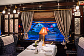 Art deco restaurant wagon of the train Belmond Venice Simplon Orient Express luxury train.