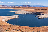 Boaters on Lake Powell, near Wahweap Bay in the Glen Canyon National Recreation Area, Arizona.