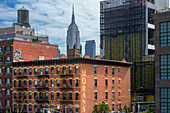Empire state building and Moran's building seen from New york high line new urban park formed from an abandoned elevated rail line in Chelsea lower Manhattan New york city HIGHLINE, USA