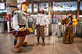 Actors performing Don Quixote de la Mancha and Dulcinea del Toboso in Atocha train station in Madrid, Spain.