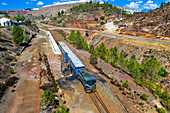 Old touristic train used for tourist trip through the Rio Tinto mining area, Huelva province, Spain.