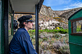 Brakeman in Aliva nº 4 locomotive in the El Tren de Arganda train or Tren de la Poveda train in in Rivas Vaciamadrid, Madrid, Spain