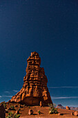 Stars over moonlit Standing Rock in the Maze District of Canyonlands National Park in Utah.