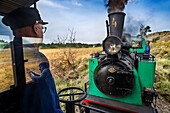 Brakeman in Aliva nº 4 locomotive in the El Tren de Arganda train or Tren de la Poveda train in in Rivas Vaciamadrid, Madrid, Spain