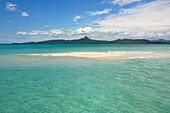 France, Mayotte island (French overseas department), Grande Terre, M'Tsamoudou, islet of white sand on the coral reef in the lagoon facing Saziley Point