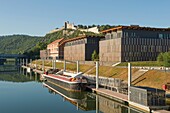 France, Doubs, Besancon, le Doubs mirror of the city of Arts and citadel from the Bregille bridge and river port with houseboat