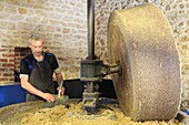 France, Saone et Loire, Iguerande, oil mill J.Leblanc (1878), manufacture of walnut oil with a stone wheel