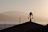 France, Corse du Sud, Campomoro, Moor's head on the roof of a house