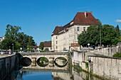 France, Jura, Dole, the Charity building of the Charles Nodier high school and the bridge of the main street on the tanners canal