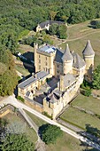 France, Dordogne, Dordogne valley, Perigord Noir, Marquay, Puymartin castle (aerial view)