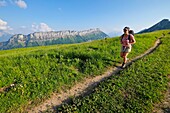 France, Haute Savoie, Entremont, hiker on the Auges mountain
