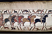 France, Calvados, Bayeux, Tapestry Museum, Bayeux Tapestry, listed as World Heritage by UNESCO, Queen Mathilde Tapestry telling the story of England's invasion by William the Conqueror , the scenes of the Bayeux Tapestry are embroidered with woollen threads on a linen canvas