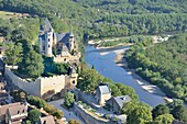 France, Dordogne, Vitrac dominated by the castle of Montfort (aerial view)