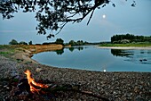 France, Doubs, low Doubs valley, Petit Noir, bonfire at full moon