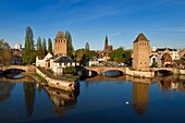 France, Bas Rhin, Strasbourg, old town listed as World Heritage by UNESCO, Petite France District, defensive towers of the covered bridges and Notre Dame Cathedral in the background