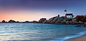 France, Finistere, Pays des Abers, Brignogan Plages, the Pontusval Lighthouse on the Pointe de Beg Pol at sunset