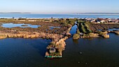 France, Bouches du Rhone, Marignane, Etang de Berre, The Jaï, Small Bourdigue, ruins of old factories, Bolmon pond in the foreground (aerial view)