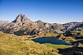 France, Pyrenees Atlantiques, Bearn, hiking in the Pyrenees, GR10 footpath, view on the lakes of Gentau and Miey and the Pic du Midi d'Ossau