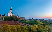 France, Finistere, Pays des Abers, Brignogan Plages, the Pontusval Lighthouse on the Pointe de Beg Pol at sunrise